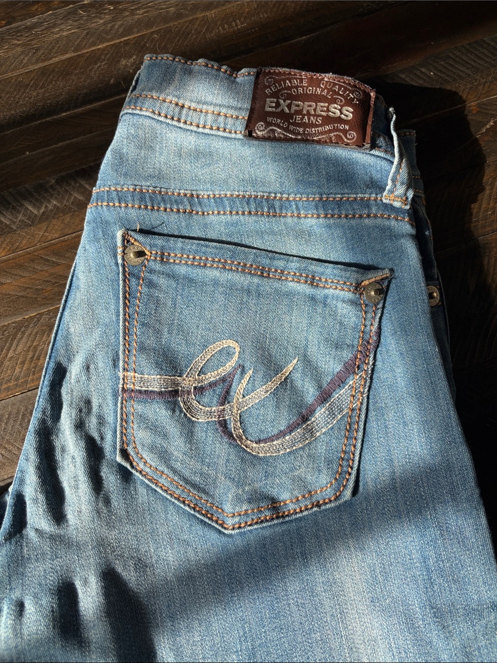 Express women’s Light Blue Slim Jeans with Embroidered Back Pocket